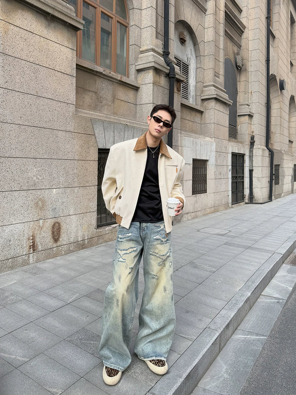 Irregular abrasion  worn-out washed denim jeans for men